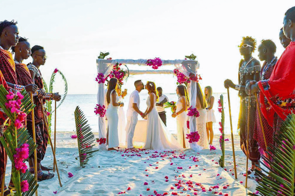 Beachfront wedding setup at The Mora Zanzibar overlooking turquoise ocean