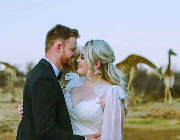 Couple celebrating a luxury safari wedding at a Tanzania lodge