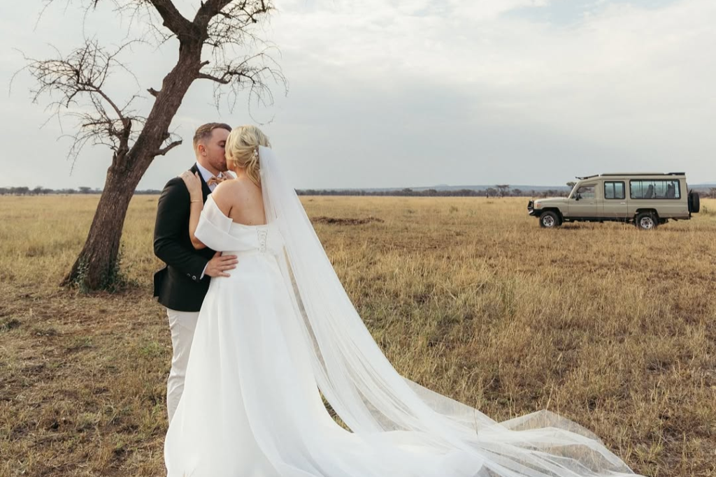 Couple celebrating a luxury Maasai Mara proposal with Cube Nation Tanzania