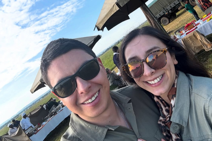 Couple on safari during Serengeti calving season in Tanzania