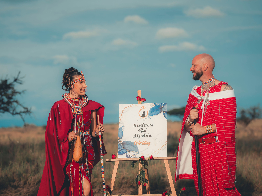 Couple celebrating a wedding ceremony during a safari in Serengeti National Park Tanzania