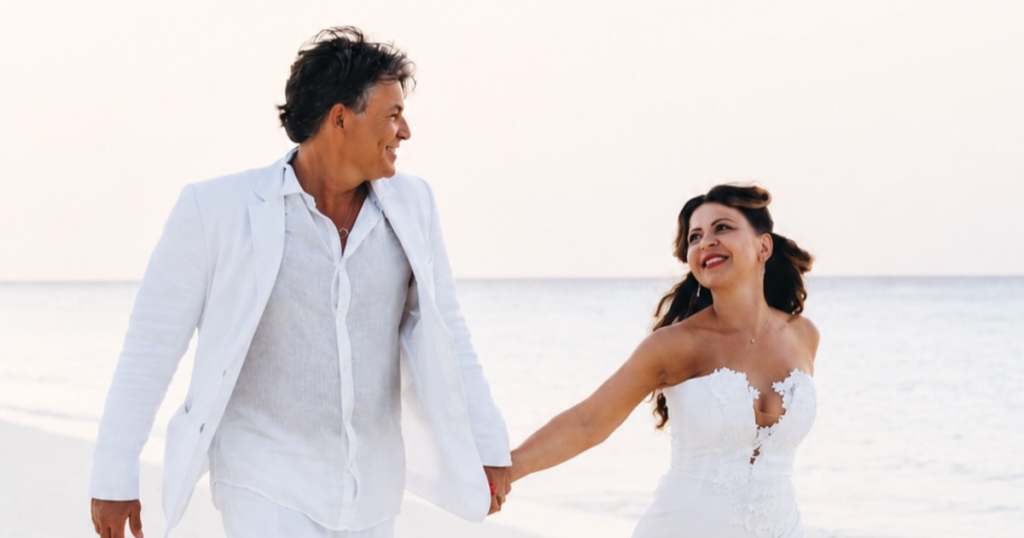 Romantic wedding ceremony setup on Nakupenda Sandbank in Zanzibar surrounded by turquoise waters.