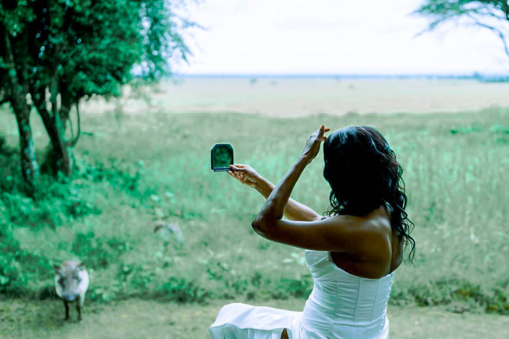 Couple preparing for a luxury Serengeti wedding at Kubu Kubu Tented Lodge, part of a Tanzania micro wedding package